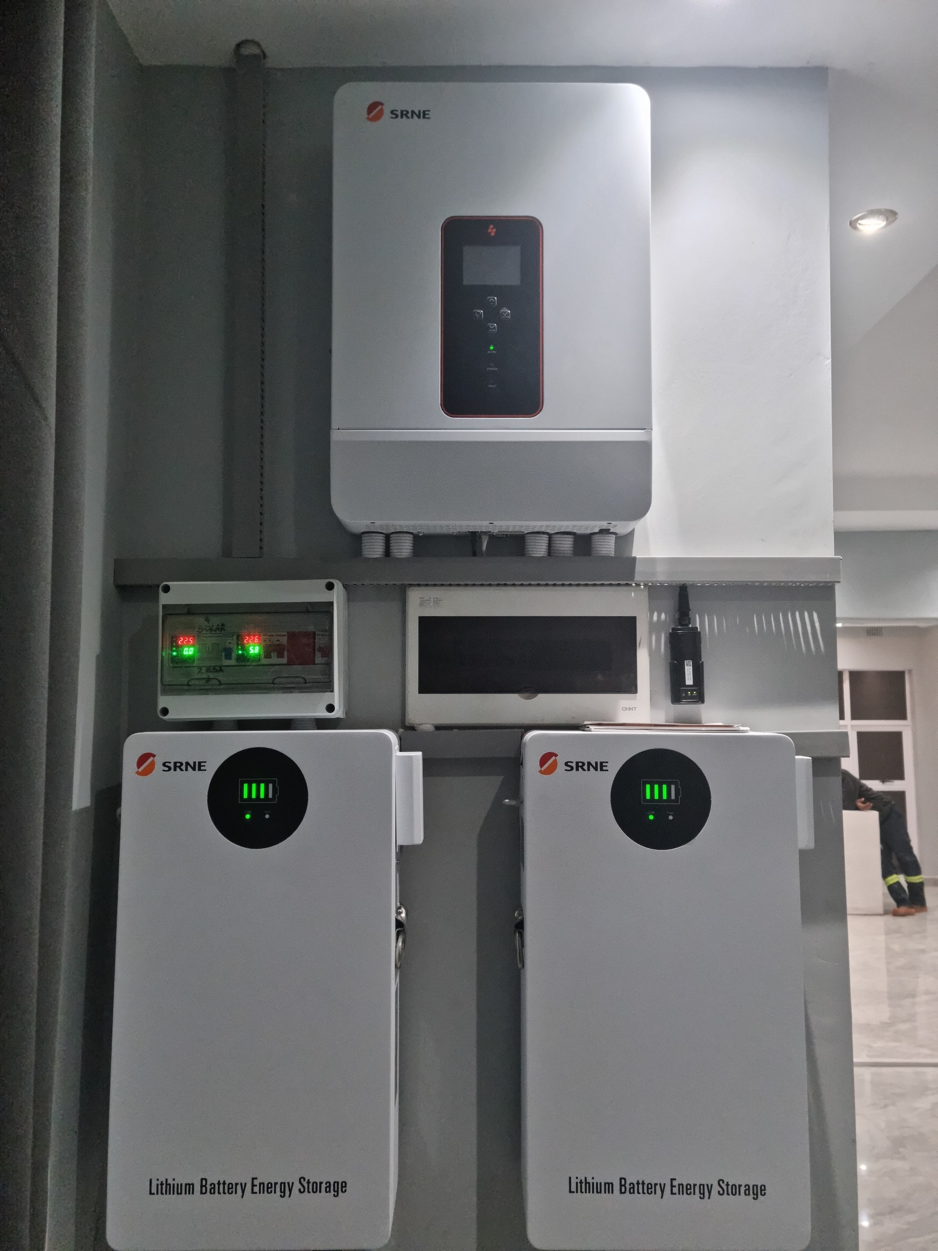 Neatly installed inverter and battery bank